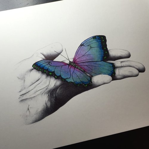 Snapshot: a blue and violet butterfly resting on an open palm drawn in Bic