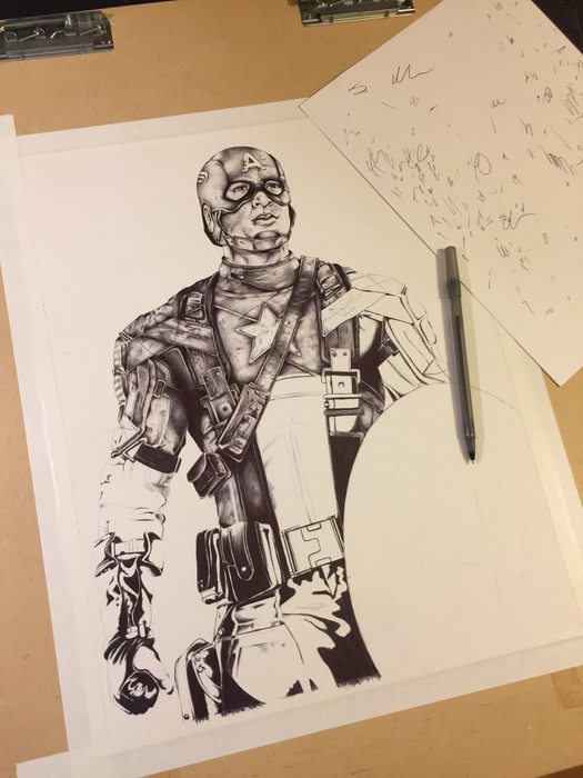 Captain America half-drawn in Bic pen, the shield still a pencil outline